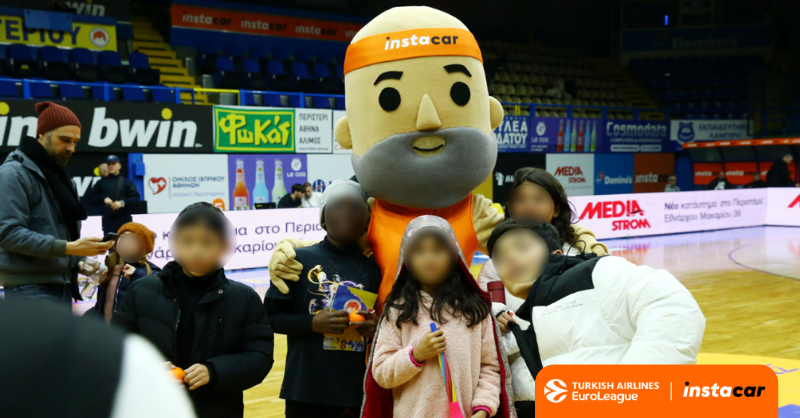 instacar's mascot, Car Boldie, with children